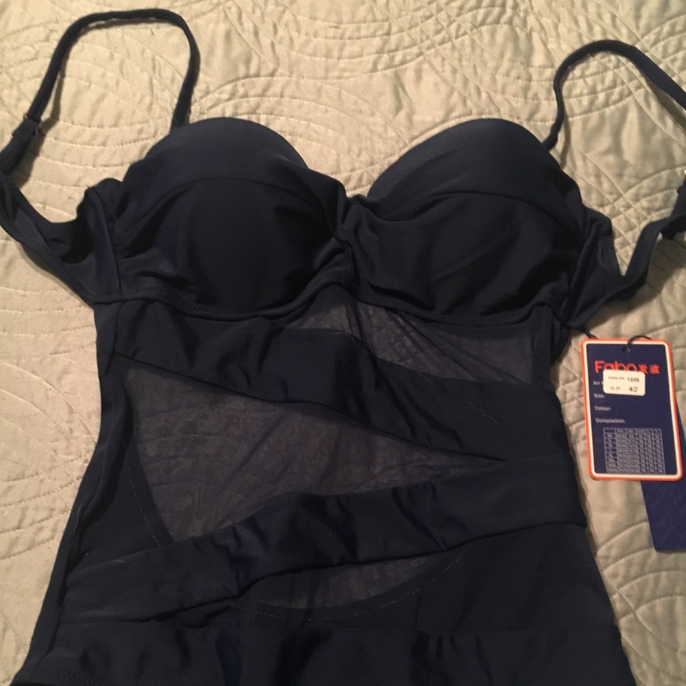 NWT navy one piece. Sz 42 (small 8-10)